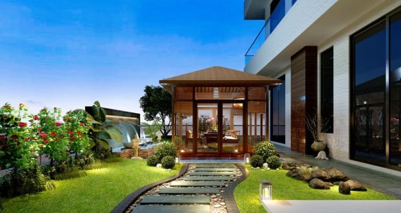 Une maison moderne avec une façade en pierre et de grands panneaux solaires sur le toit, illustrant la construction écologique au Maroc